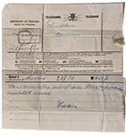 Télégramme de 1907, usé, informant que le bateau qu’a pris la famille Castelein vers le Canada n'est pas encore arrivé.